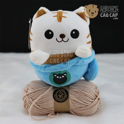 Mèo con ngồi trong Ly