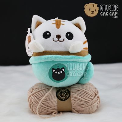 Mèo con ngồi trong Ly