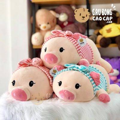 Heo bông Nằm mặc áo sọc đeo băng đô sọc