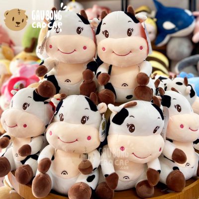 Gấu Bông Bò Sữa Ngồi Cười Mỉm