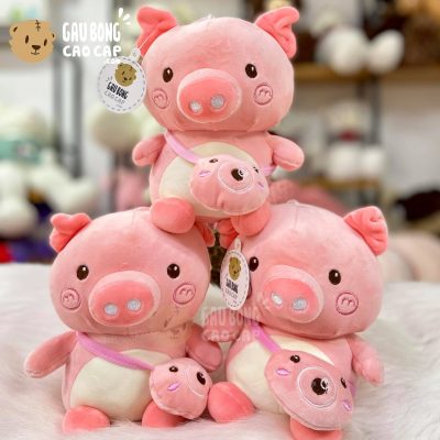 Heo Bông hồng ngồi đeo máy ảnh