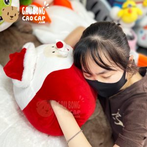 Gấu Bông Noel Gối ôm tròn đút tay Ông già Noel
