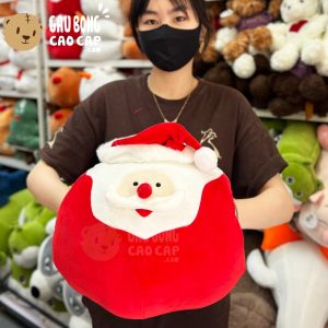 Gấu Bông Noel Gối ôm tròn đút tay Ông già Noel