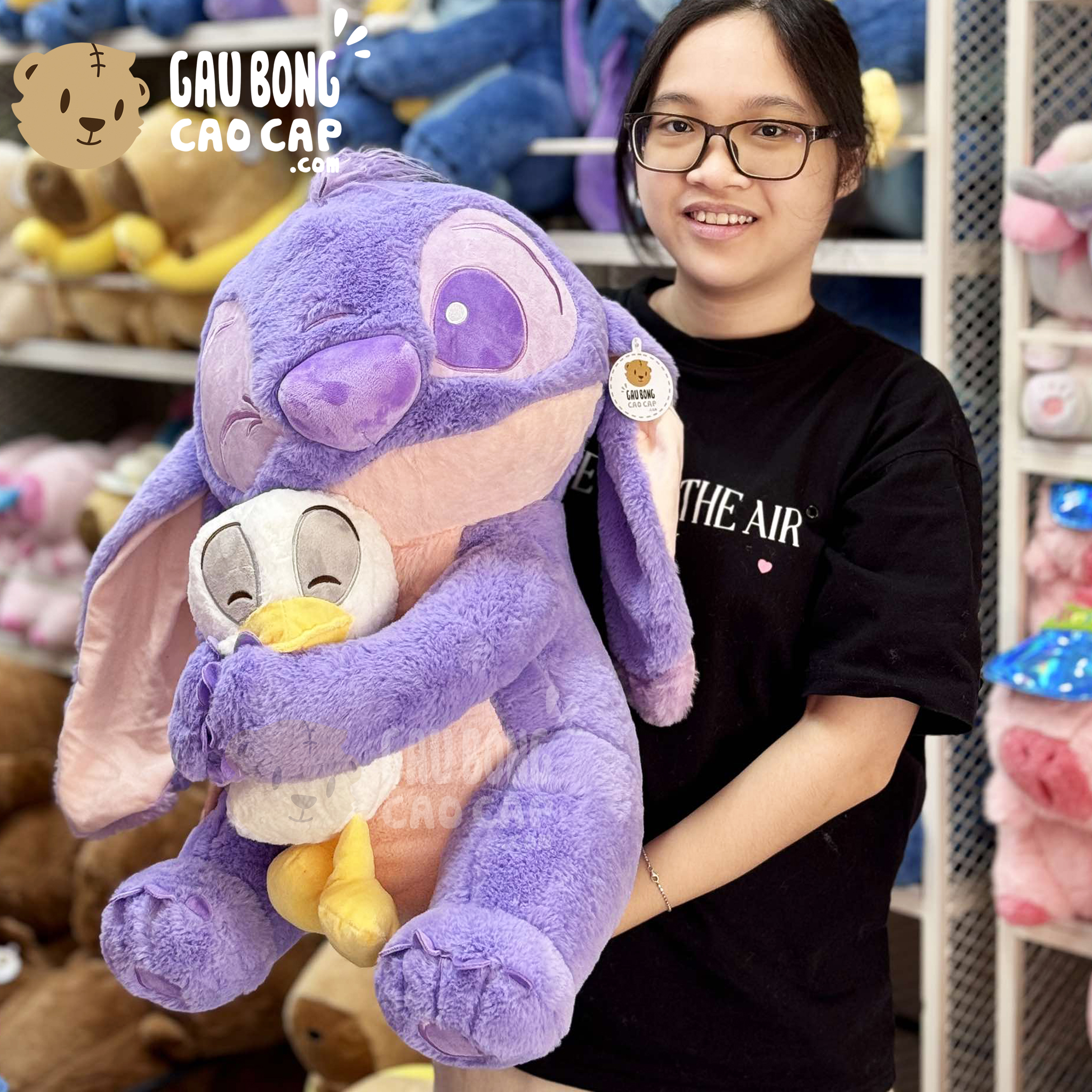 Gấu Bông Stitch Tím ôm Vịt Trắng