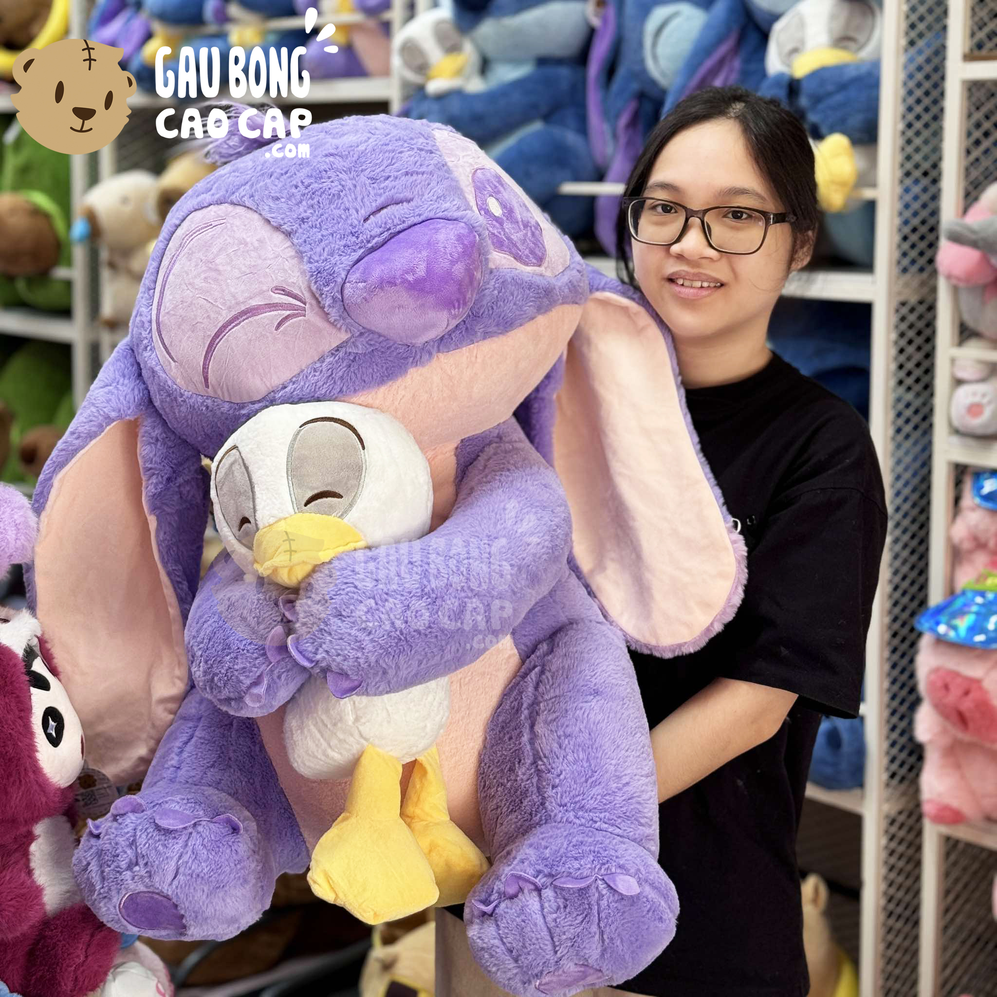 Gấu Bông Stitch Tím ôm Vịt Trắng