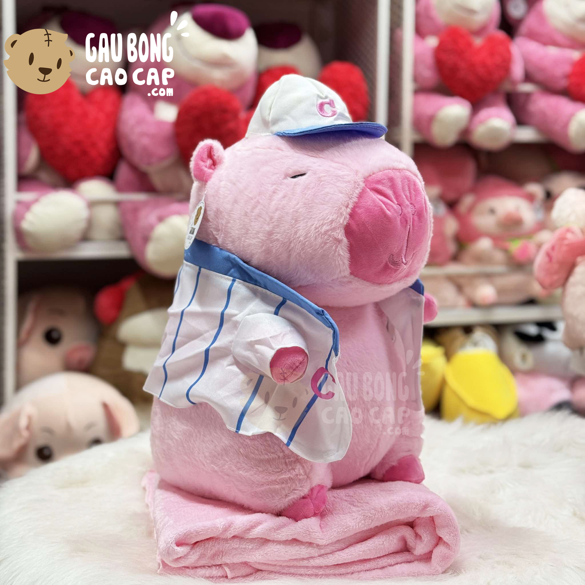 Gấu Bông Capybara Hồng đội nón mặc áo sọc có Mền 2in1