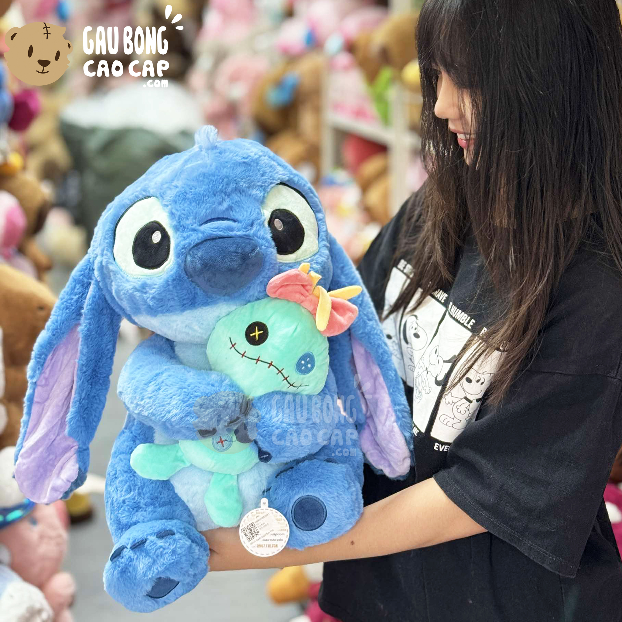 Gấu Bông Stitch Xanh ngồi ôm Búp bê