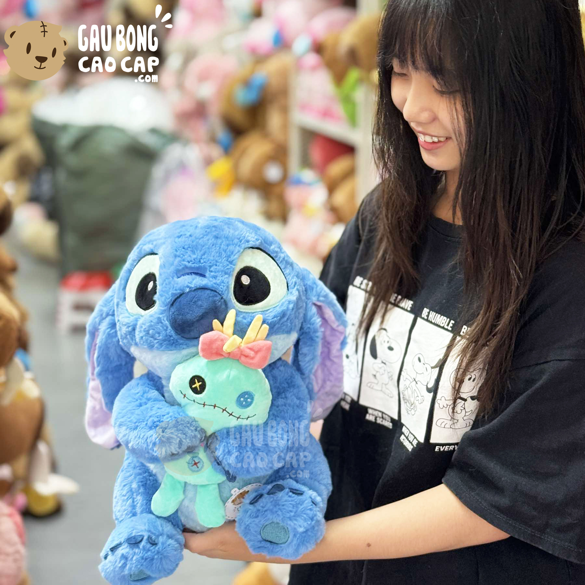 Gấu Bông Stitch Xanh ngồi ôm Búp bê