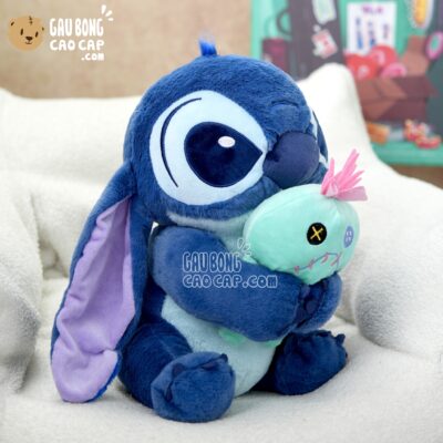 Gấu Bông Stitch Xanh ngồi ôm Búp bê
