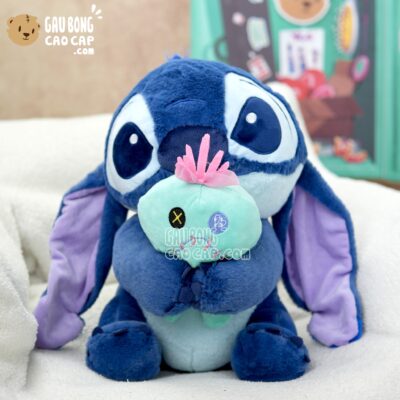 Gấu Bông Stitch Xanh ngồi ôm Búp bê