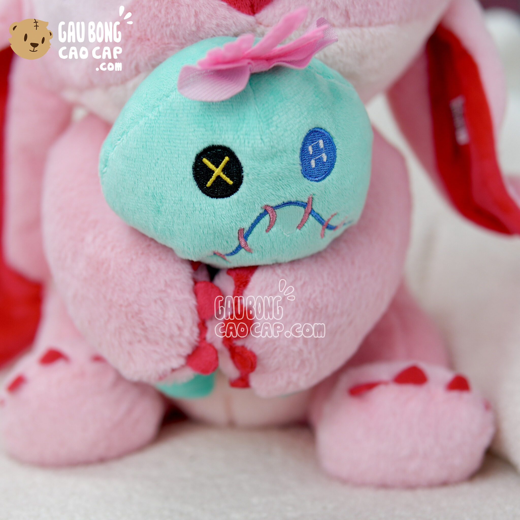 Gấu Bông Stitch Hồng ôm búp bê