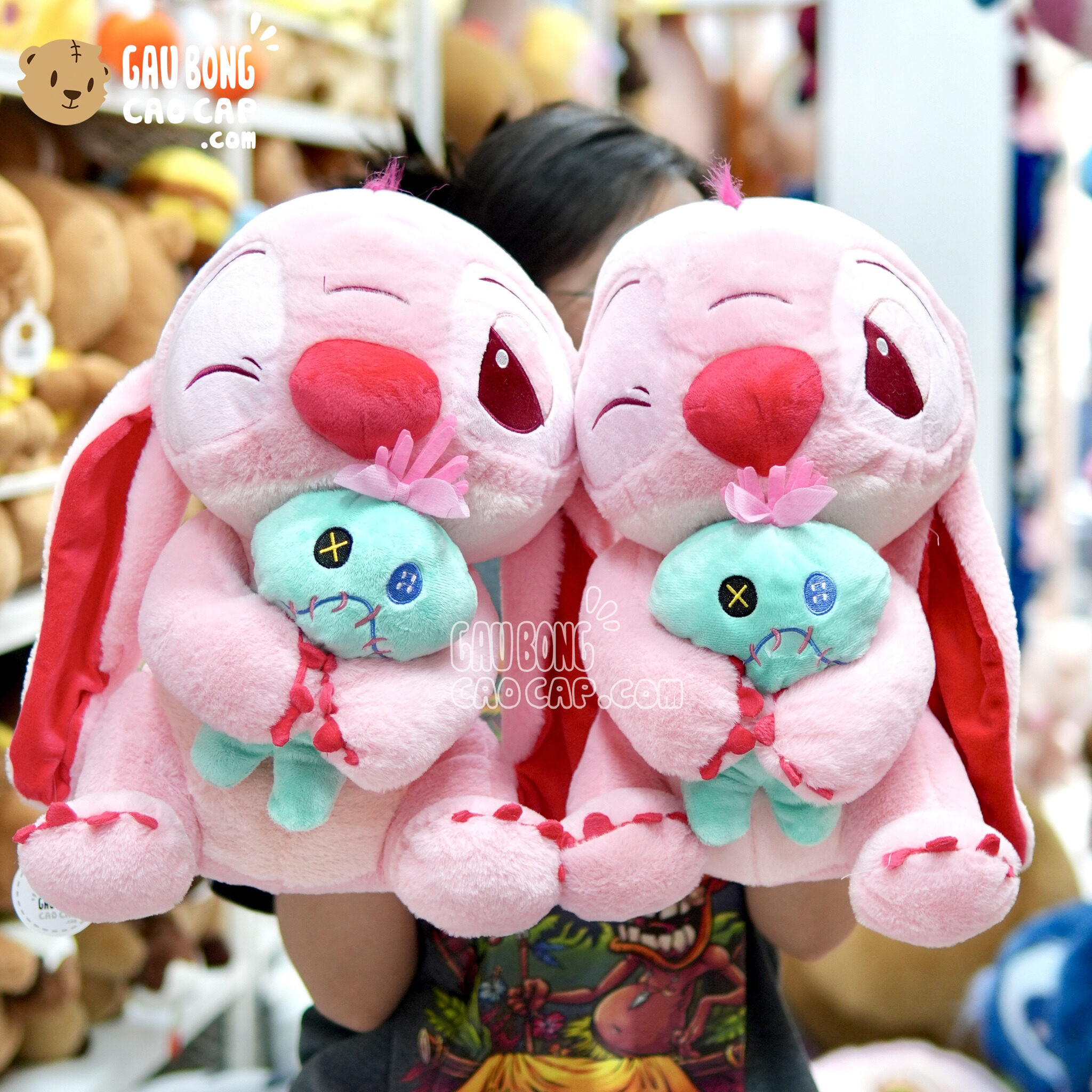 Gấu Bông Stitch Hồng ôm búp bê