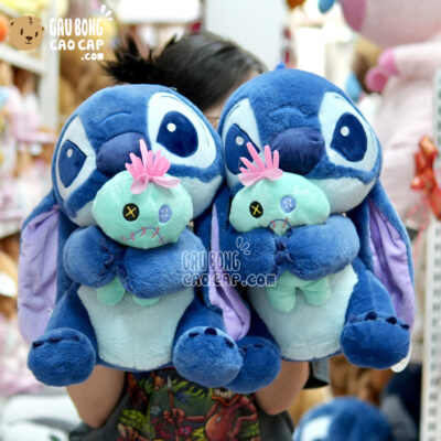Gấu Bông Stitch Xanh ngồi ôm Búp bê