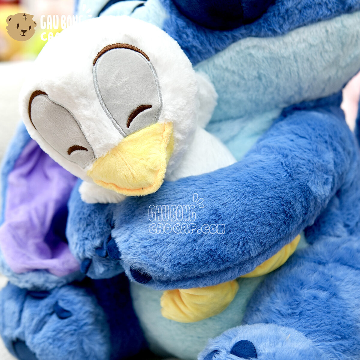 Gấu Bông Stitch xanh ôm Vịt Trắng