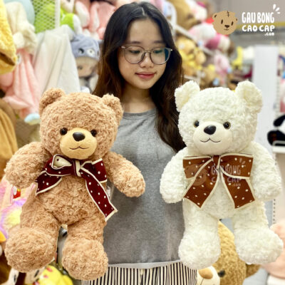 Gấu Teddy lông xoắn đeo nơ chấm bi