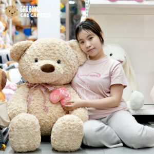 Gấu Teddy lông xoắn ngực Tim Rút -  Màu Kem
