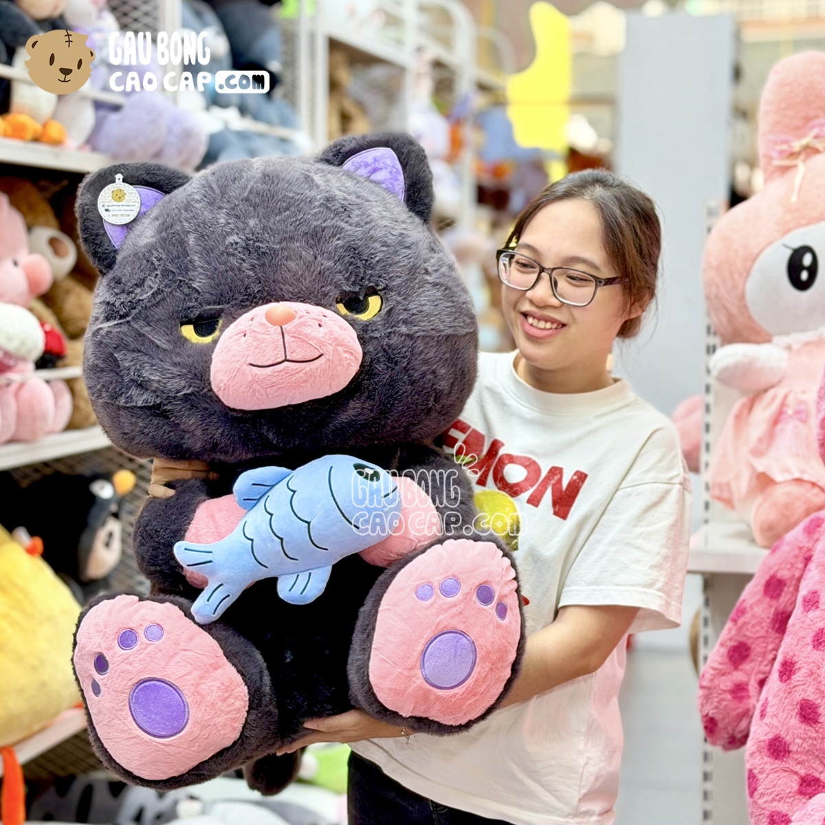 Gấu Bông Mèo Mun ngồi ôm Cá