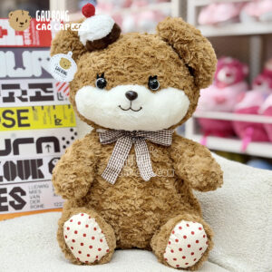 Gấu Nâu Cupcake đeo nơ Caro