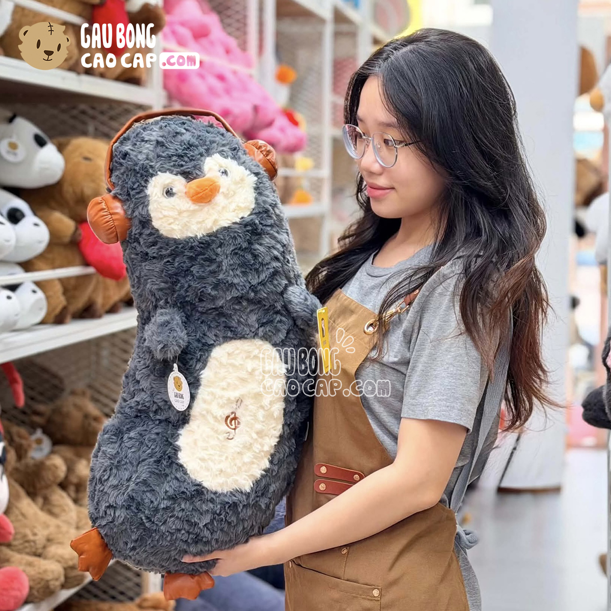 Gấu Bông Chim Cánh Cụt gối ôm dài đeo HeadPhone