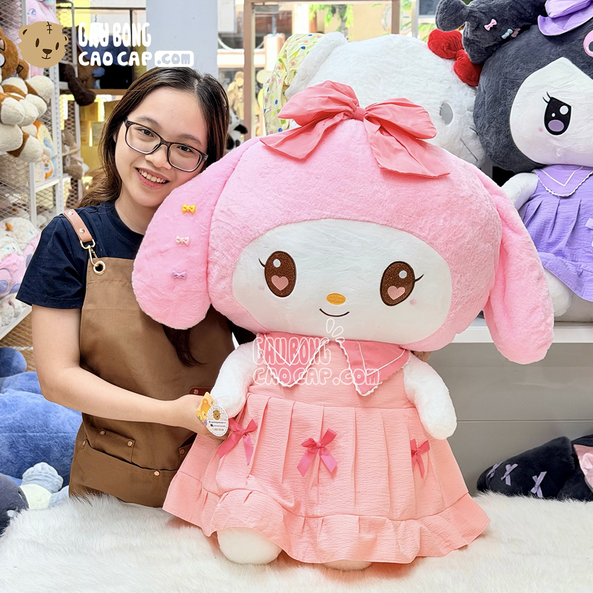 Gấu Bông Melody Đầm Hồng Cổ Sen Đeo Nơ 